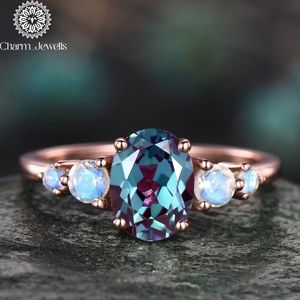 Anillo de compromiso de moissanita para mujer Charm_Jewells, chapado en oro rosa sobre plata, corte cojín, engaste de garras, anillo clásico con gema - Product Image 1