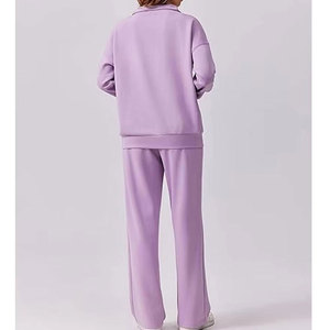 Conjuntos deportivos acampanados de moda para mujer, de corte relajado, ideales para ropa informal y un estilo urbano moderno. - Product Image 3