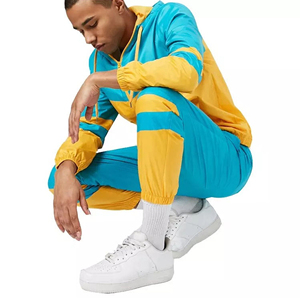 ชุดวอร์มกันลมสำหรับผู้ชาย ผลิตจากโพลีเอสเตอร์ 100% ระบายอากาศได้ดี แห้งเร็ว กันน้ำ รับสกรีนโลโก้ตามแบบ บริการ OEM - Product Image 2