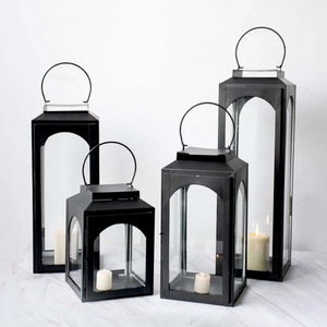 <b>Black</b> Metal <b>Lanterns</b> With Toughened Glass Panels For Home Decoration Durable Iron Candle Holders Set Of Four Different Sizes - Product Image 1
