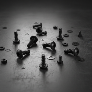 Vis d'ancrage pour béton robustes de marque PDC - Fixations en acier au carbone à tête cylindrique avec rondelle, revêtement noir - Product Image 1