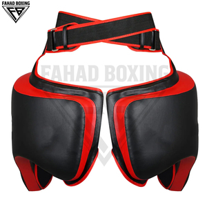 Protectores de muslo profesionales para boxeo y MMA en color negro y rojo con diseño de correa cruzada segura para venta al por mayor. - Product Image 1