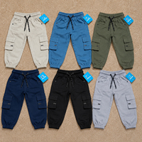 Pantalon cargo enfant personnalisé avec logo, taille élastique, multi-poches, en sergé de coton, pour garçons, vente en gros, lot en stock