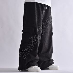 Pantalon de neige noir de haute qualité avec tissu 100% polyester, taille à cordon, poches zippées aux genoux, fermeture velcro et bas élastique - Product Image 4