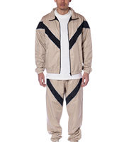 Ensemble de survêtement beige pour homme, 2 pièces, avec veste coupe-vent sportive à motif chevron noir et pantalon à fermeture éclair intégrale
