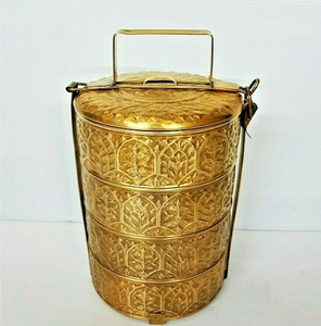 Antique brass 4-tier tiffin featuring intricate floral carvings and traditional handle. Royal look. Available at wholesale price - Product Image 1