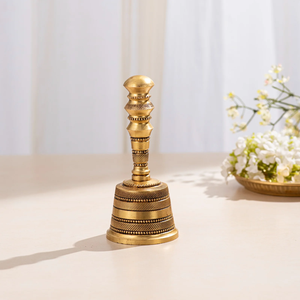 Antique finish brass hand bell featuring ornate floral carvings and layered finial, available at wholesale prices. - Product Image 5