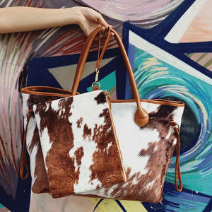 Bolso de mano de piel de vaca marrón de ante personalizable para mujer, 100 unidades, venta al por mayor, bolso de fin de semana grande negro y blanco de piel de vaca, bolso de moda de piel corta con diseño animal - Product Image 6