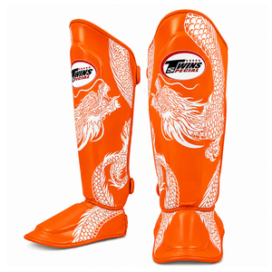 Protège-tibias en cuir de vachette orange durables pour le kickboxing, le Muay Thai et le MMA – Vente en gros - Product Image 1