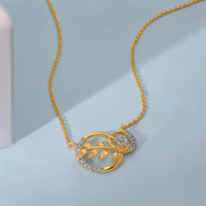 Interlocking Botanical <b>Circle</b> Diamond Necklace with Golden Leaf Branch and Elegant Double <b>Ring</b> Design - Product Image 5