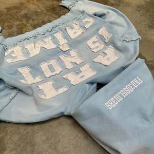 Light Blue Cropped Hoodie. Oversized <b>Bleached</b> Effect Graphic Hoodie. Distressed Raw Hem Streetwear Crop Jacket. OEM Manufacturer - Product Image 3