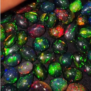 137 pièces d'opale noire éthiopienne naturelle avec reflets, de 10 mm à 15 mm, cabochons ovales, poire, octogone, 288 carats, pierres précieuses Iroc Sales, 923 $ US - Product Image 3