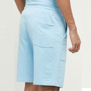 กางเกงขาสั้นผู้ชายผ้าฝ้ายฟลีซดีไซน์ใหม่ล่าสุด 100% เอวยางยืด 3 กระเป๋า สีพื้น สไตล์ไฮสตรีท ความยาวระดับเข่า ปักลายตามสั่ง - Product Image 5