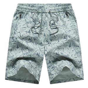 Pantalones cortos de baño informales para playa con bolsillos y cremallera de secado rápido de poliéster con logotipo personalizado al por mayor de fábrica de alta calidad - Product Image 1