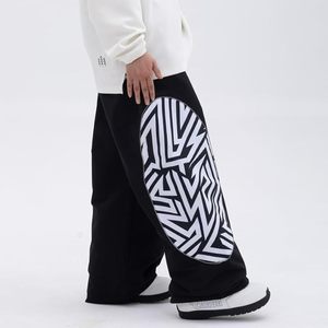 กางเกงสกีแบบเรียบ น้ำหนักเบา กันลม กันน้ำ สำหรับทุกเพศ เป็นมิตรกับสิ่งแวดล้อม แห้งเร็ว เหมาะสำหรับสวมใส่ในเมือง - Product Image 6