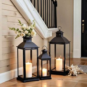Elegant tabletop metal <b>candle</b> <b>lantern</b> with glass enclosure for safe lighting and beautiful home decoration ambiance - Product Image 1