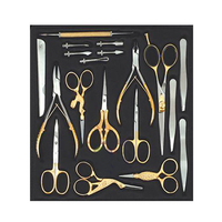 Kit de beauté professionnel en acier inoxydable, couleur semi-or, comprenant coupe-ongles, ciseaux et limes à ongles, avec boîte personnalisable pour logo.