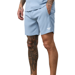Shorts de sport texturés bleu clair pour hommes 100 % coton écologique taille haute élastique avec cordon de serrage respirant séchage rapide pour la course - Product Image 1