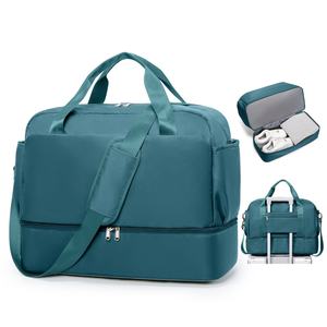 Sac de voyage et de sport imperméable bleu sarcelle avec compartiment pour trolley, sac de week-end grande capacité avec compartiment à chaussures inférieur et rembourré - Product Image 1