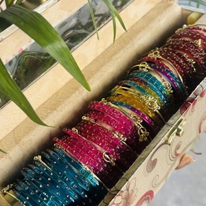 Vibrant Handcrafted Multicolor Glass <b>Bangle</b> Set with Gold-Toned Bead Detailing and Floral Vanity Storage - Product Image 1