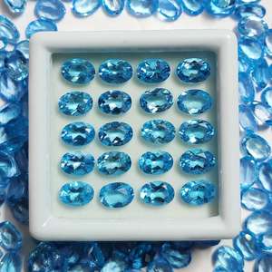 บลูโทแพซสวิสธรรมชาติทรงรีเจียระไนแบบเหลี่ยม  ขนาดมาตรฐาน  พร้อมใบรับรอง  ไม่ผ่านการปรับแต่ง  พร้อมสำหรับการฝังในเครื่องประดับ - Product Image 1