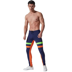 Leggings elegantes para MMA hechos con tela elástica de primera calidad que ofrece comodidad, flexibilidad, transpirabilidad y soporte confiable. - Product Image 3