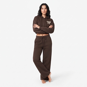 Conjunto de dos piezas de última moda para mujer: top corto con cremallera completa, manga larga, hombros caídos y sudadera con capucha, y pantalones jogger de pierna ancha, 100% algodón polar. - Product Image 3