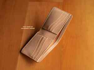 Nueva Cartera de Cuero Genuino Bifold para Hombre con Compartimento para Billetes y Monedas, Elegante y Moderna - Product Image 4