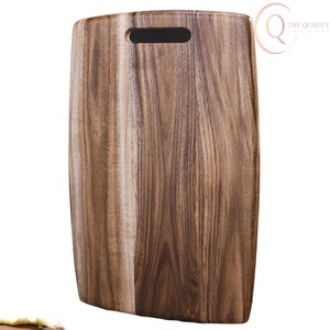 Planche à découper robuste en bois massif, surface compatible avec les couteaux pour une préparation alimentaire sûre et efficace - Product Image 1