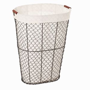 Panier à linge décoratif en fer pour l'intérieur de la maison avec un motif métallique élégant et une base ovale stable - Product Image 1