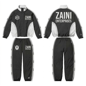 Traje Cortavientos de Poliéster Taslon Premium de 120 GSM, Panel en Contraste Blanco y Negro, Logotipo Personalizado con Serigrafía - Product Image 1