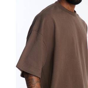 เสื้อยืดคอกลมแขนสั้นทรงบ็อกซี่ผ้าฝ้าย 100% สีพื้น พิมพ์โลโก้ตามสั่ง OEM รุ่นใหม่ล่าสุดสำหรับผู้ชาย สวมใส่สบายๆ - Product Image 3