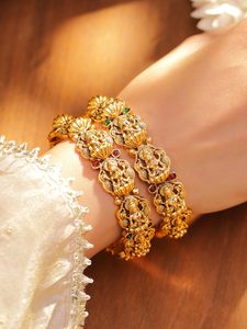 Juego de Brazaletes y Gargantilla de Lujo de Latón Chapado en Oro Antiguo con Diseño Intrincado de Diosa Lakshmi y Engaste Floral, Regalo Nupcial Indio Kada - Product Image 2
