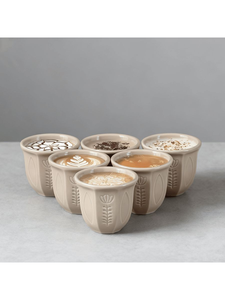 Taza de cerámica artesanal con esmalte moteado y forma orgánica, ideal para hogares minimalistas y apartamentos tipo estudio. - Product Image 5