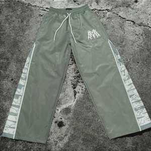 Pantalones de chándal holgados de pierna ancha ajustables con logotipo bordado, ropa de calle personalizada, pantalones de chándal de nailon atléticos para hombre en blanco Retro Unisex - Product Image 4