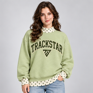 เสื้อสเวตเชิ้ตคอเต่าสีเขียวอ่อนสำหรับผู้หญิง แต่งลายจุดสีงาช้าง พร้อมลายกราฟิกแบบวาร์ซิตี้ แขนยาว สั่งทำขายส่งได้ - Product Image 1