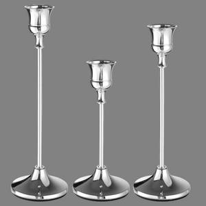 Support de bougie en métal, directement de l'usine, pour la décoration intérieure, centre de table de mariage et décoration d'événements, disponible à la vente - Product Image 1