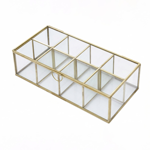 This versatile glass and brass organizer is designed for stylish <b>storage</b> of tea bags jewelry or <b>makeup</b> accessories - Product Image 1