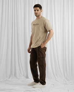 เสื้อยืดผู้ชายทรงโอเวอร์ไซส์ ผ้าฝ้ายถัก 100% พร้อมโลโก้ด้านหน้า - Product Image 1