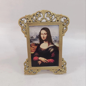 Decorative metal photo <b>frame</b> with <b>antique</b> brass finished and intricate floral designs perfect for elegant interiors - Product Image 2