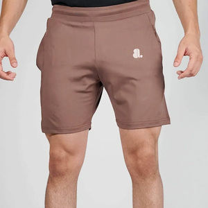 Men's <b>Black</b> Solid Quick Dry Breathable Sport Shorts Elastic Waist Knee Length Nonwoven Polyester Front Logo Drawstring Closure - Product Image 1