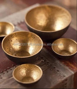 Ornate brass serving bowl featuring intricate handwork patterns symbolizing elegance sophistication and craftsmanship tradition - Product Image 1