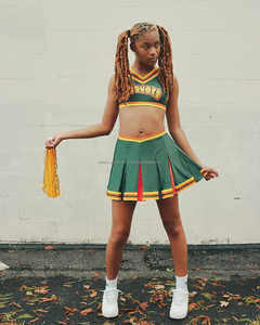 ชุดเชียร์สำหรับเด็กผู้หญิงชุดแข่งขันออกแบบได้ตามต้องการแบบ2025เทคนิคการพิมพ์ลายสีเขียวและสีเหลือง - Product Image 1