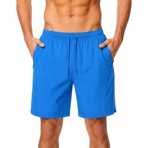 Short de bain pour homme bleu uni à séchage rapide avec poches, taille élastique, coupe décontractée mi-haute, style urbain, écologique - Product Image 1