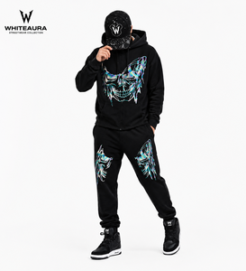 Conjunto de chándal con capucha negro para hombre Whiteaura con estampado de calavera iridiscente, sudadera y pantalones estilo streetwear con cremallera frontal completa - Product Image 1