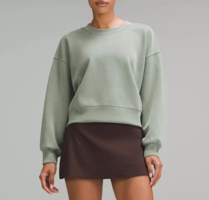 Venta al por mayor de manga larga cuello redondo Crop Top Casual sólido recortado pulóver diseño de manga larga multicolor transpirable Mujer sudadera - Product Image 2