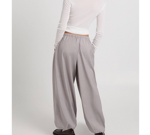 Pantalon de jogging gris personnalisé en molleton de coton style baggy pour femme, avec cordon de serrage et impression en relief, idéal pour la course, le basketball, la gym et les activités sportives (OEM/ODM) - Product Image 4