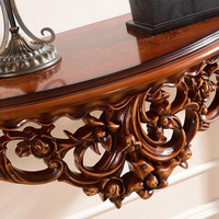 Console de style victorien en forme de demi-lune avec des sculptures florales complexes, pieds cabriolés classiques, en acajou massif, pour salon ou hôtel