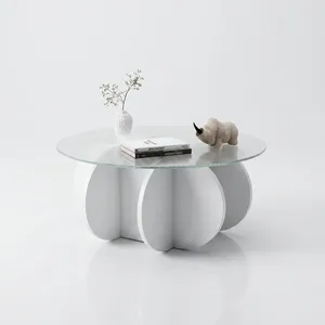 Table basse moderne en verre côtelé avec base sculpturale blanche, écologique et durable, pour salon et chambre à coucher - Product Image 1