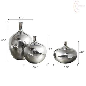 แจกันโลหะตกแต่งสำหรับตกแต่งภายในบ้านสไตล์โมเดิร์น ผลิตจากวัสดุทนทานและมีดีไซน์สวยงาม - Product Image 5